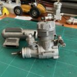 OS 50 Glow SX model aero engine with silencer and R/C Carb